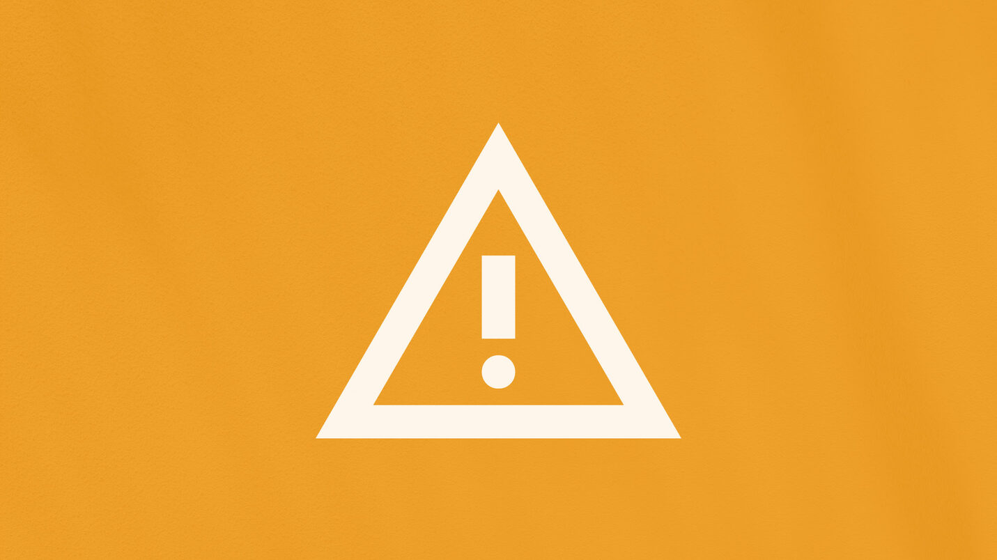 Das Foto zeigt ein Warnsymbol.