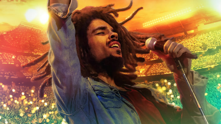 Bob Marley singend, mit Dreadlocks